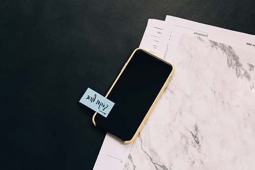 electronics black smartphone on white pad phone